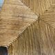 Wooden stool with a straw seat