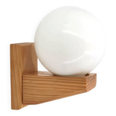 Pine wood wall light with opaque white glass globe, 1980s.