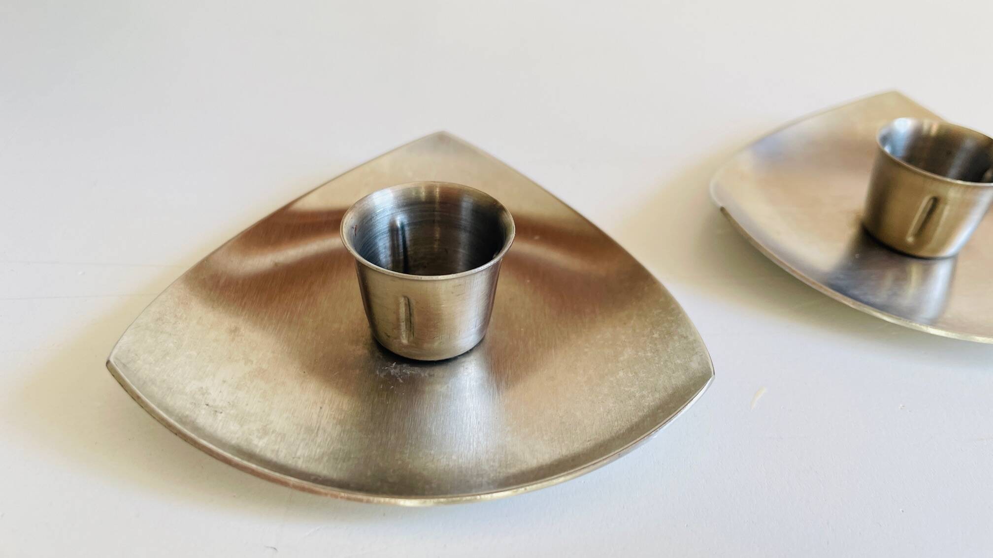 Vintage brushed metal geometric candle holders