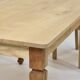 Vintage solid oak table with antique legs.