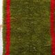 Handmade pure wool rug in green and red, size 140/260 cm.