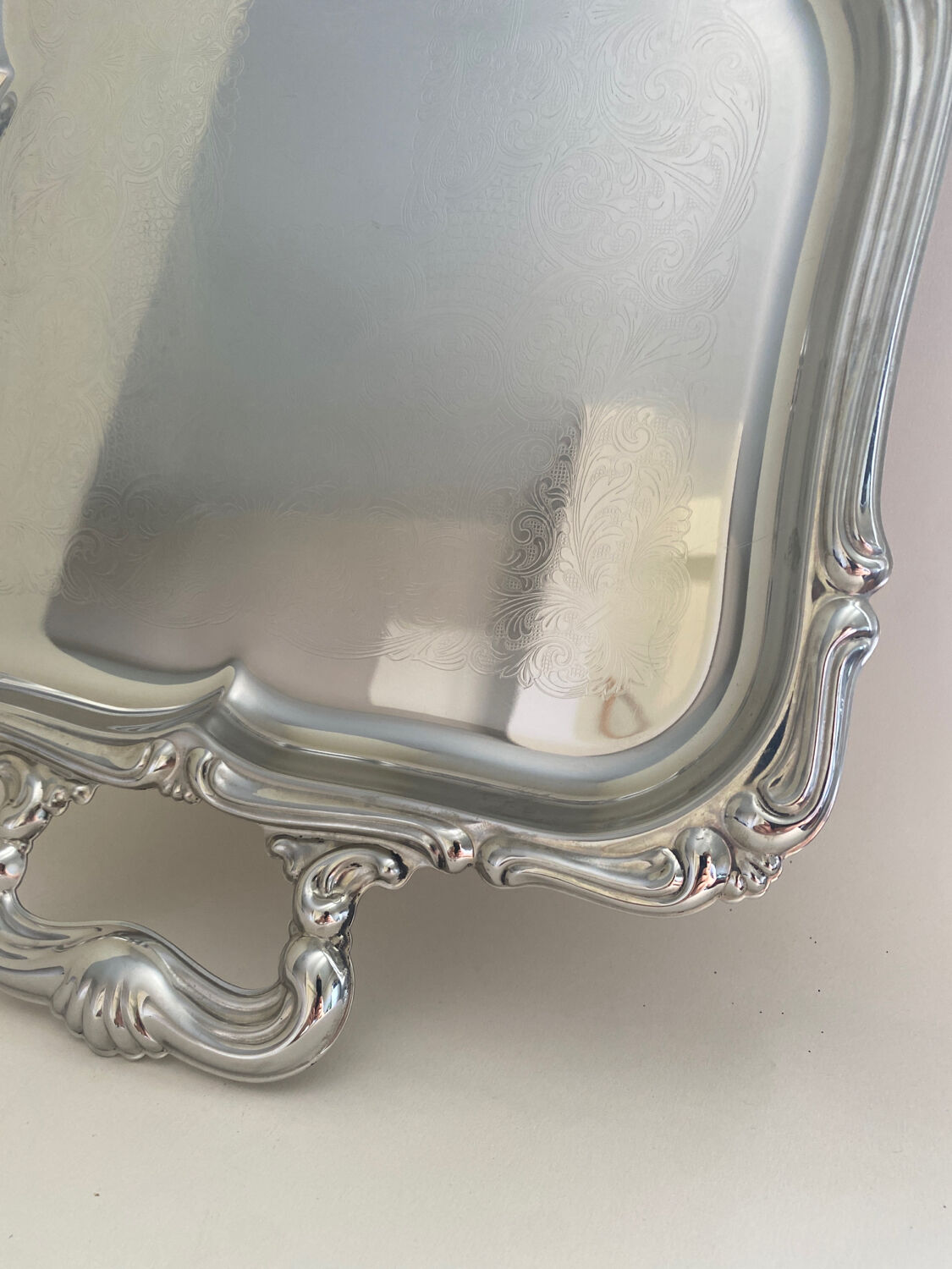 Baroque stainless steel tray Alessi