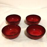 Set of 4 red bowls signed SIGG