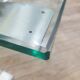 Vintage brushed steel coffee table and thick glass top - italian design