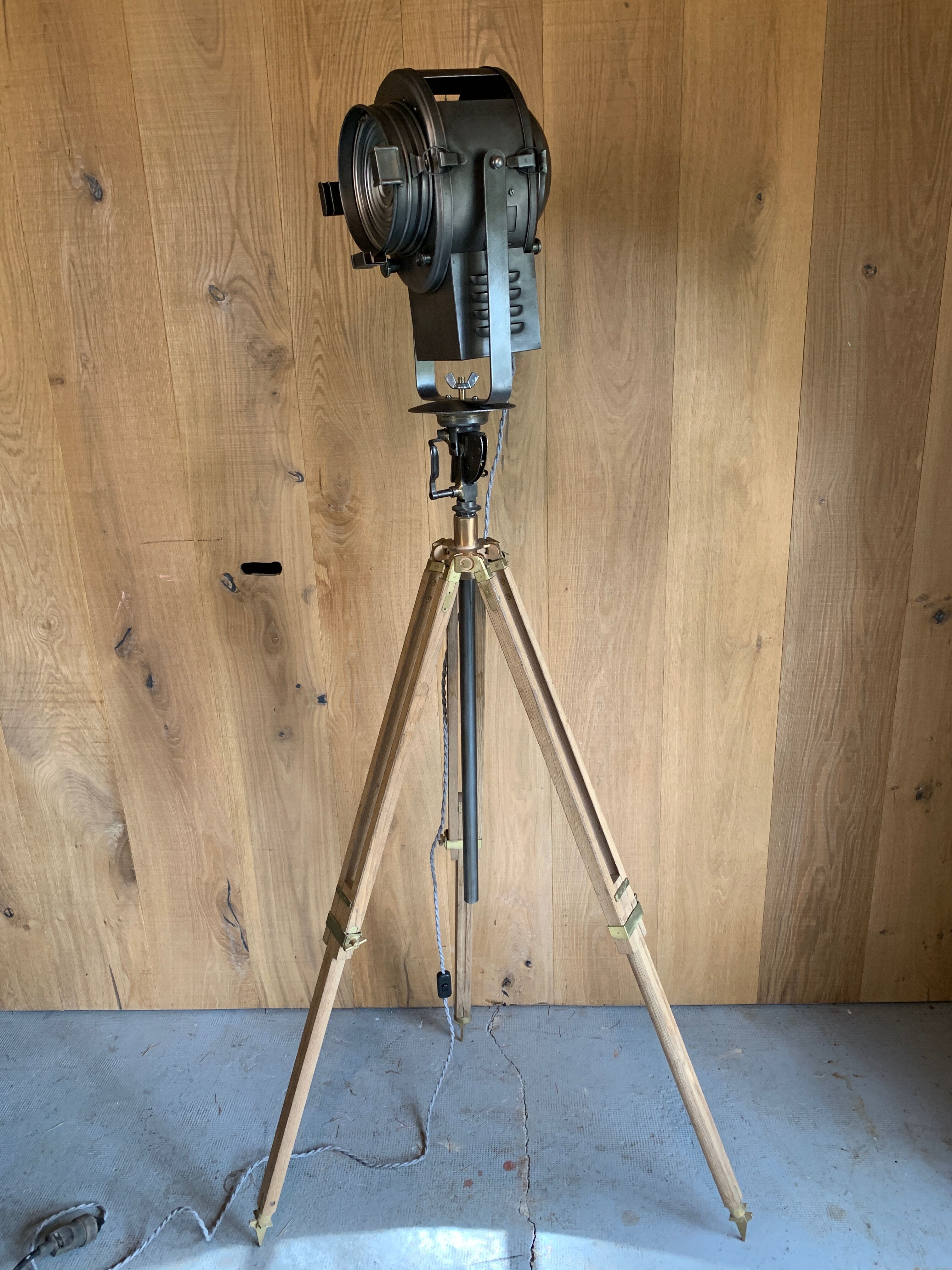 Cinema projector A.E Cremer Paris on its adjustable wooden foot circa 1960