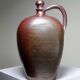 Large stoneware jar from Normandy with lustrous burgundy glaze, from the 1920s-30s.