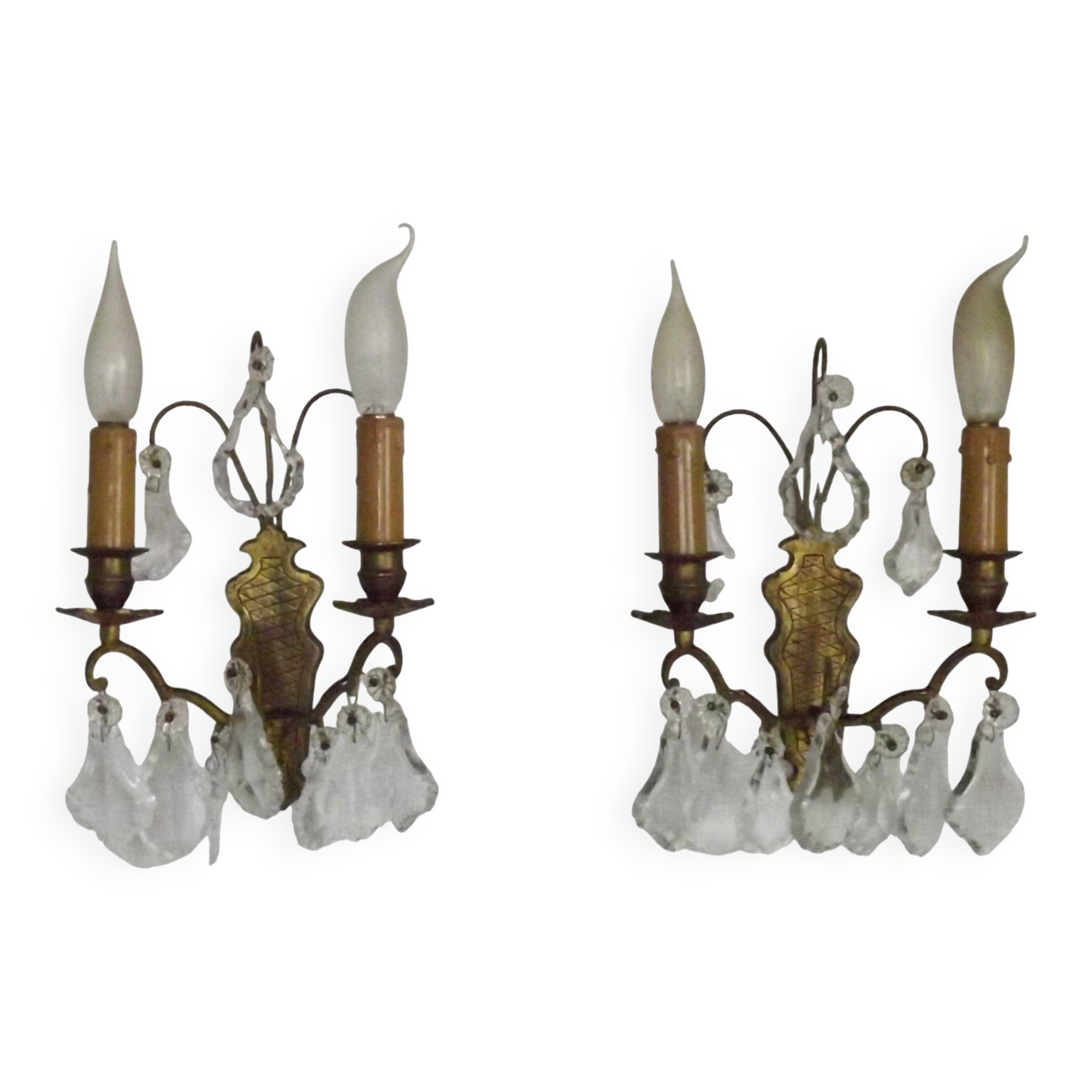 Pair of French antique brass double wall lights with assorted crystals.