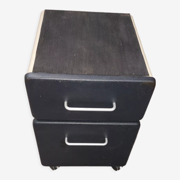 Metal box with used vintage keyless casters