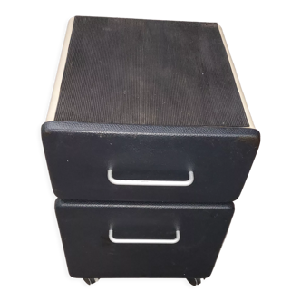 Metal box with used vintage keyless casters