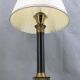 Lampe en bronze doré et patiné de style empire abat jour plissé
