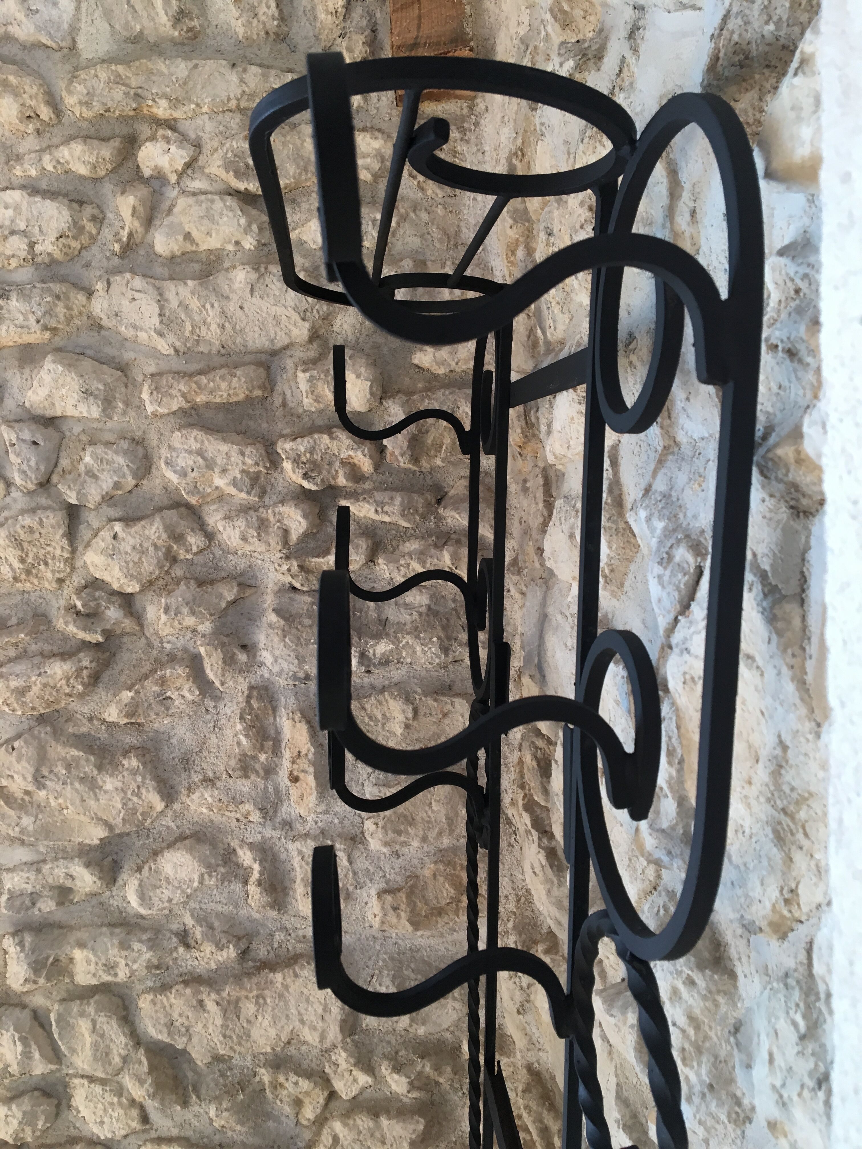 Black wrought iron coat racks