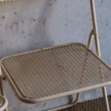 Two metal tanned folding chairs