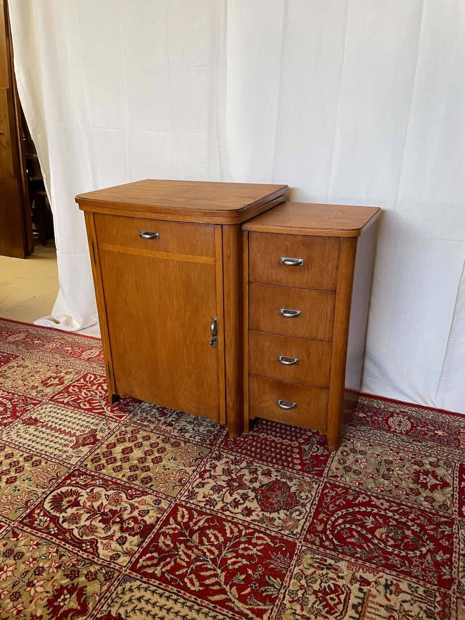 Old sewing cabinet with drawers