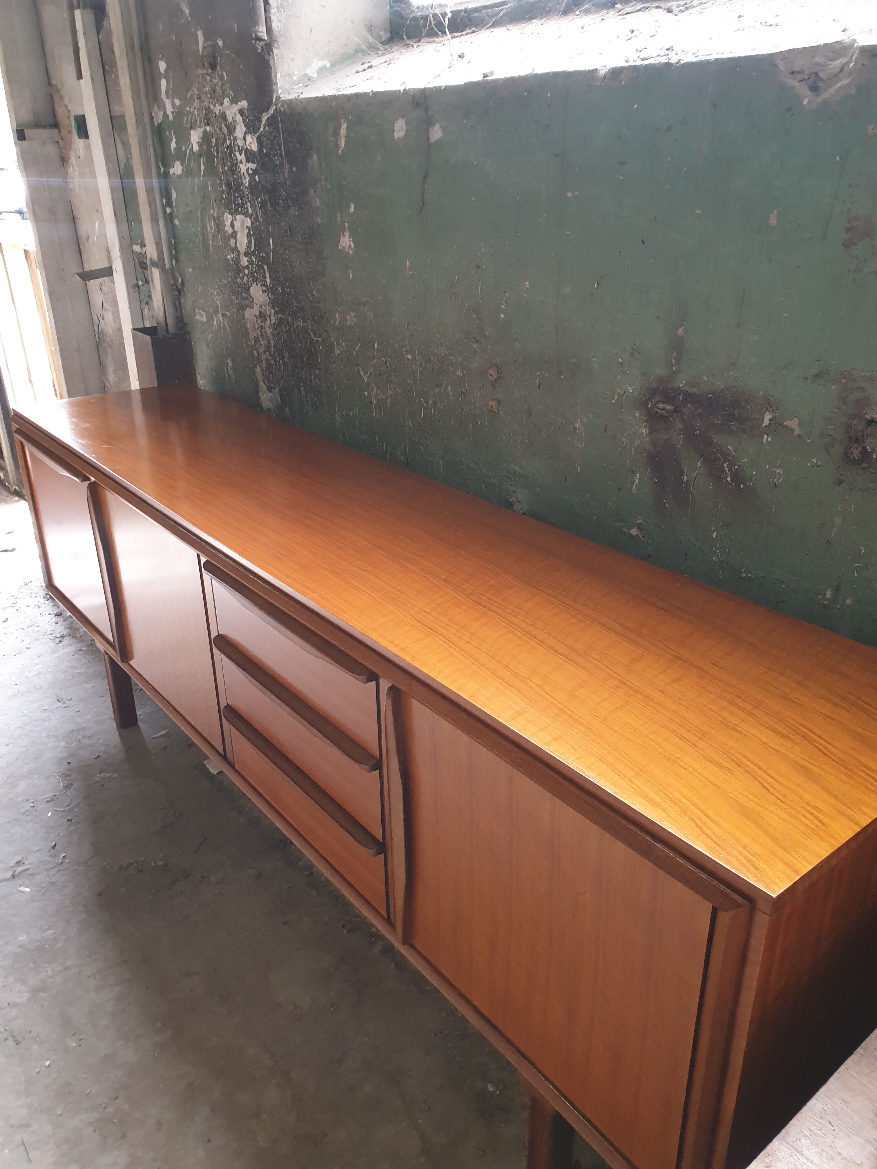 Teak sideboard of the Maison Emgé