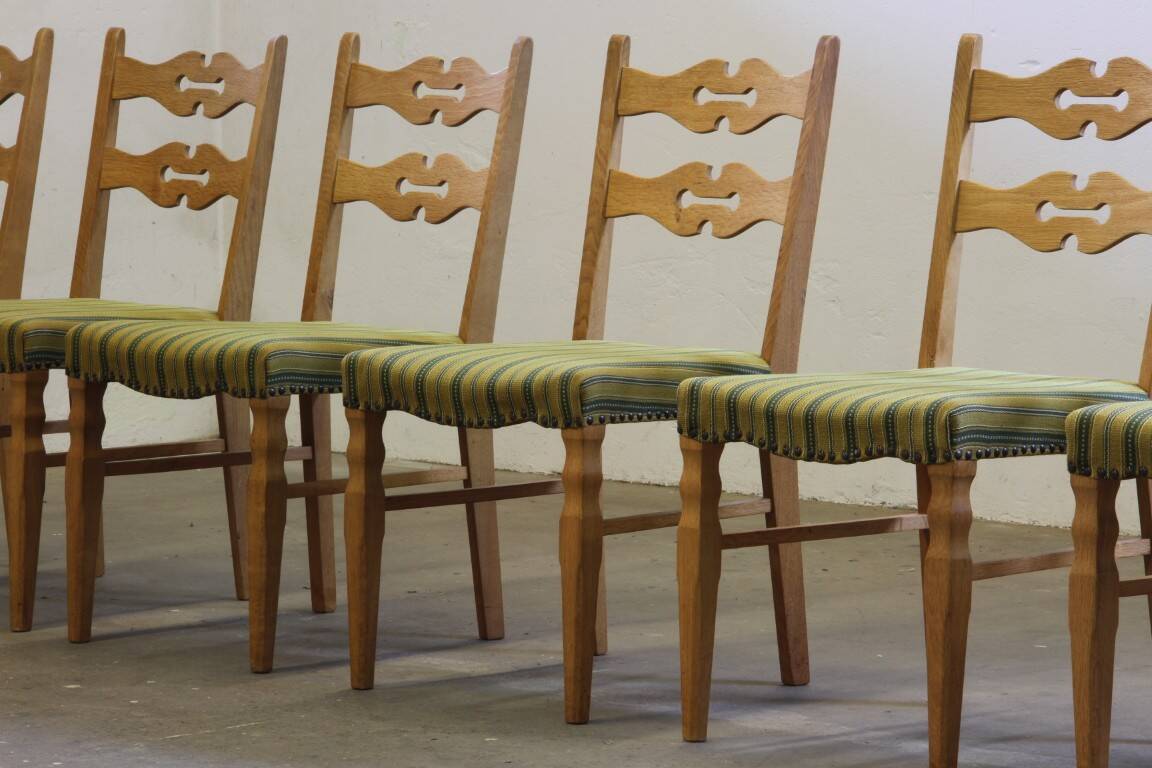 Vintage 1960s brutalist Danish modern oak dining chairs in the style of Henning Kjærnulf