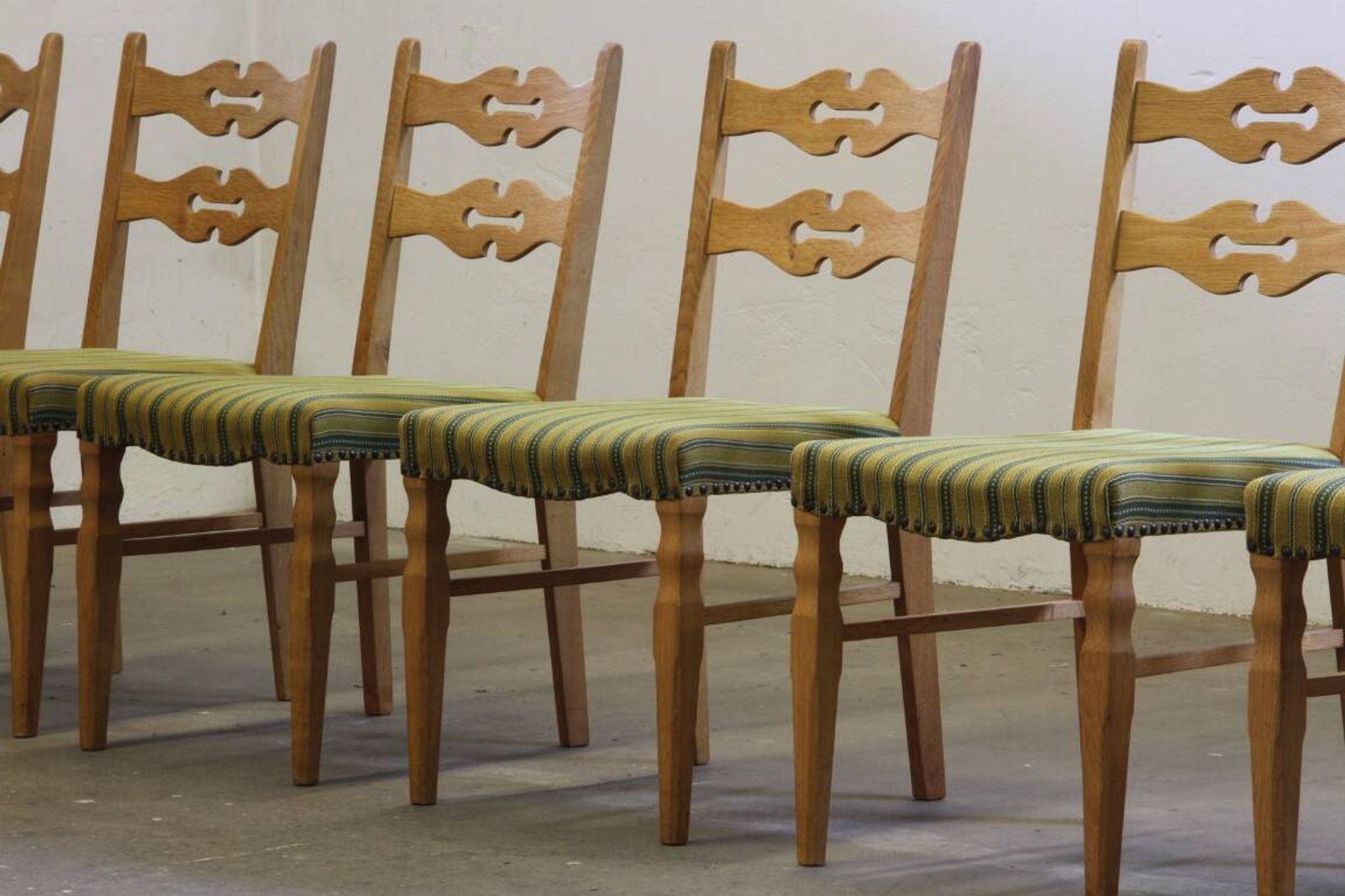 Vintage 1960s brutalist Danish modern oak dining chairs in the style of Henning Kjærnulf