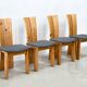 Set of four sculptural brutalist oak chairs