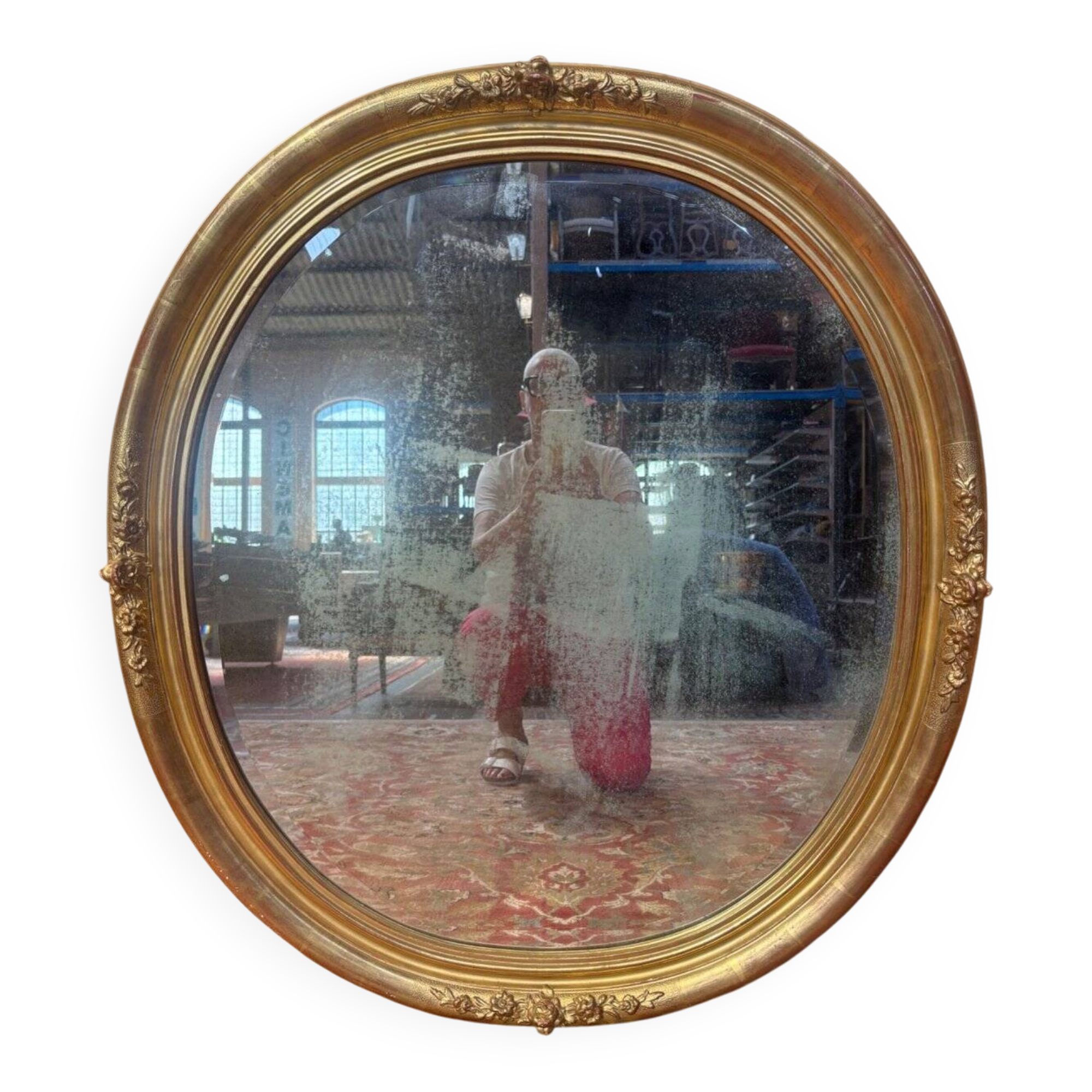Miroir ovale biseauté bois doré style Louis XVI XIXe siècle