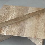 Pair of triangular travertine tables
