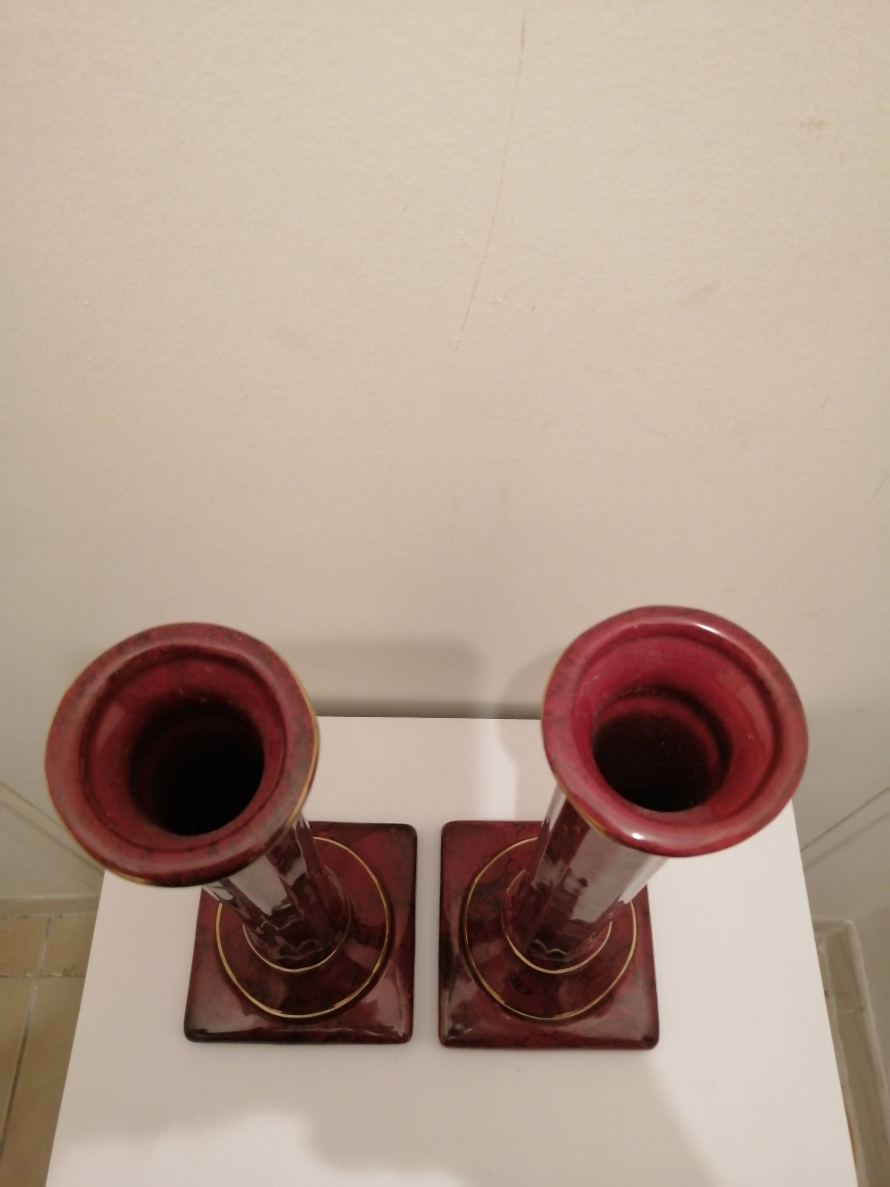 PAIR OF CERAMIC TORCHES