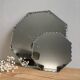 Vintage octagonal beveled mirrors