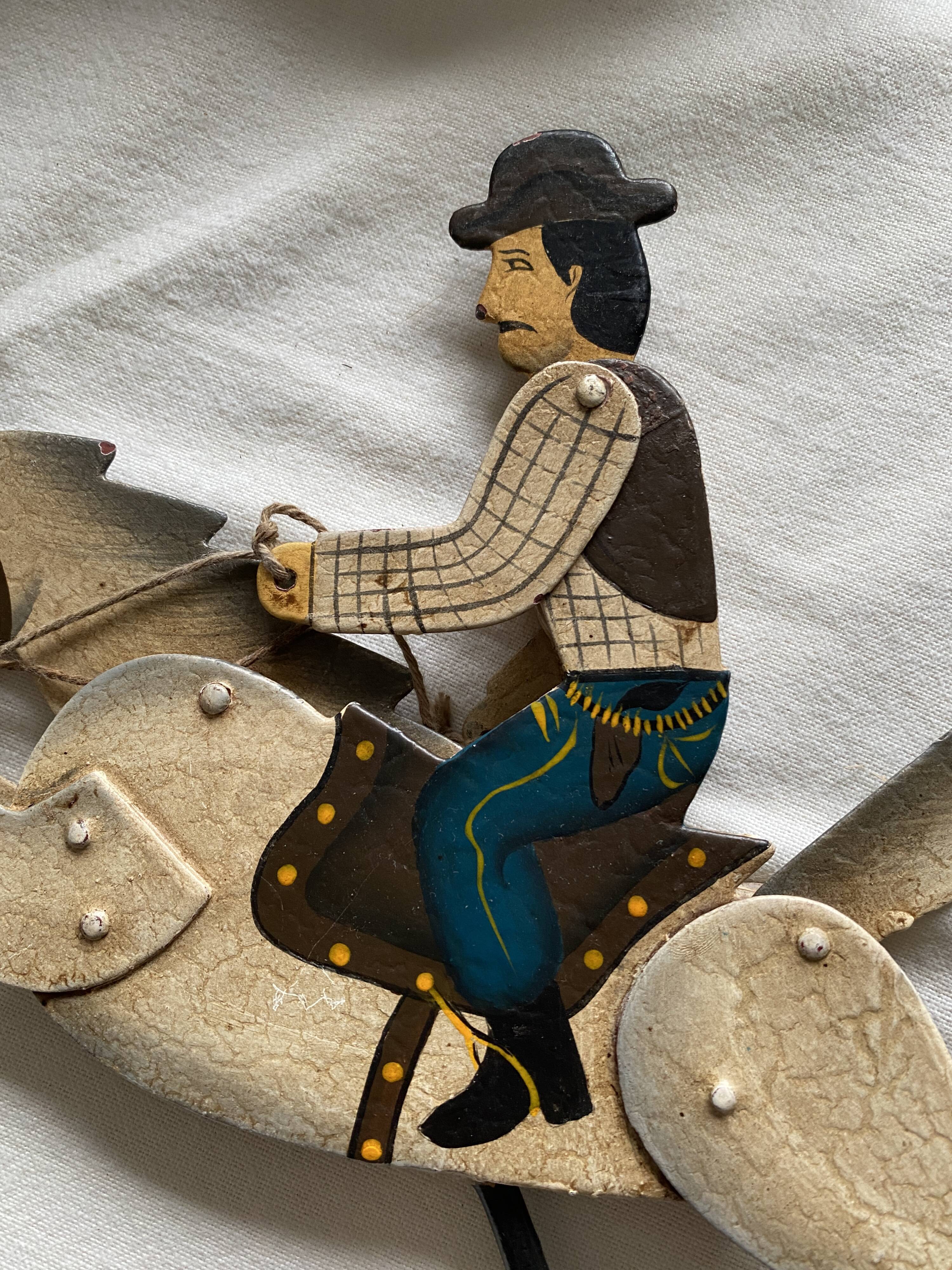 Rider and his horse in enamelled sheet metal rocking