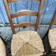 8 antique Vendée straw chairs in solid cherry wood.