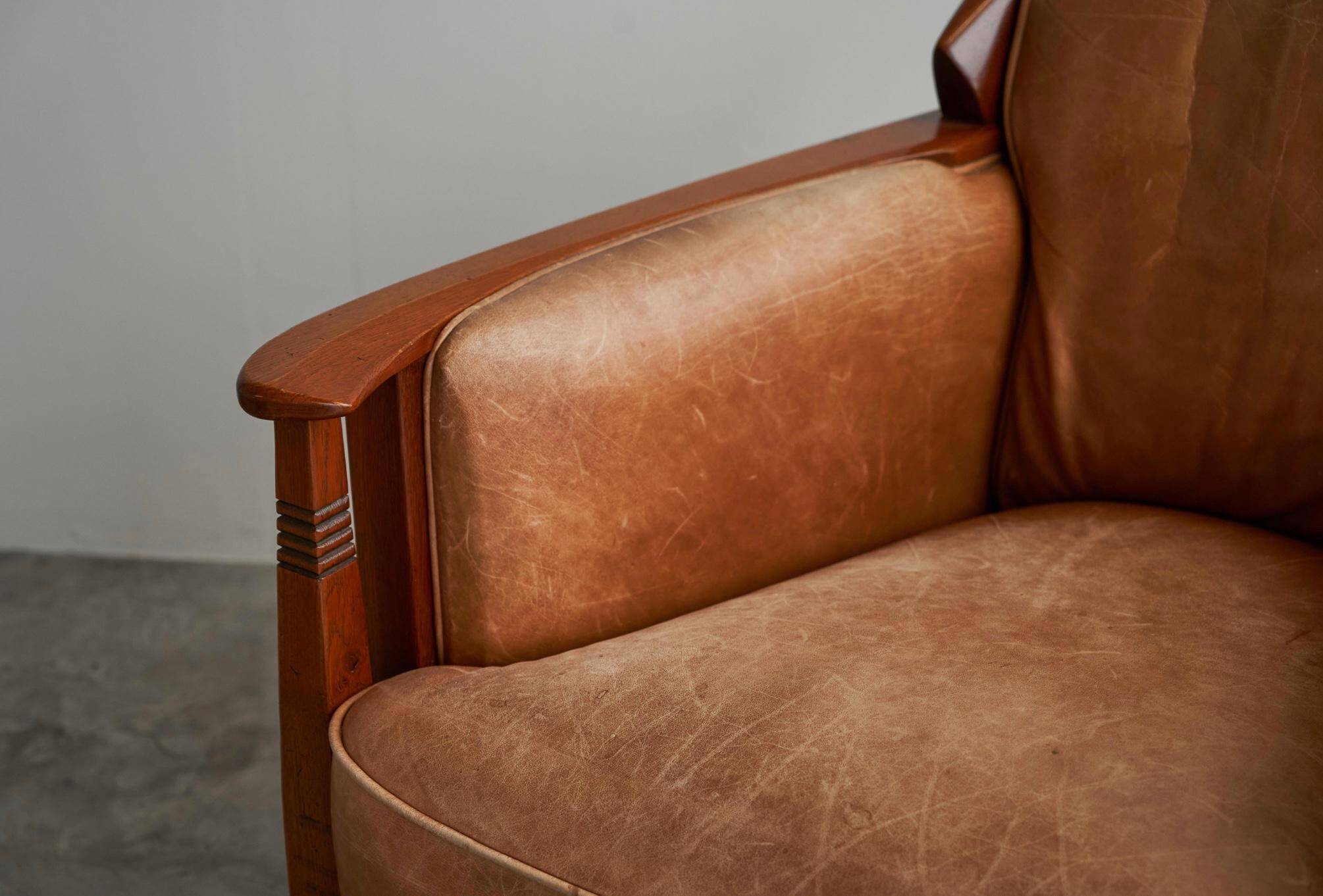 Art Deco armchair in solid oak and leather by Frits Schuitema