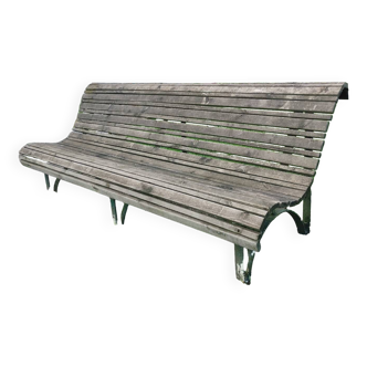 Old garden bench with cast iron legs