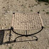 Paire de tabourets curule En fer forgé. Assise tressée