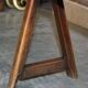Pair of antique Victorian trestle benches in fruitwood.