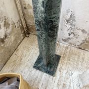 Set of 4 marble columns or pedestals.