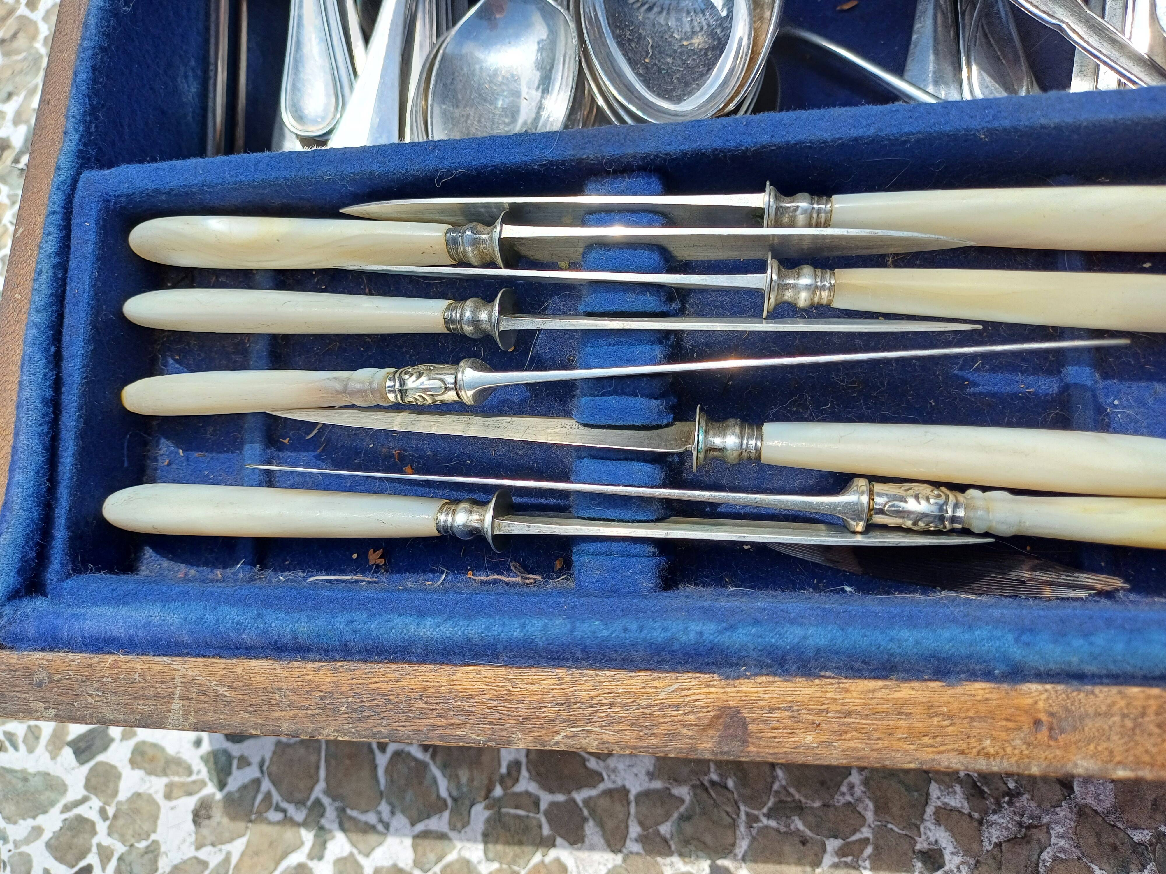 Set of silver metal cutlery from maken's + centrepiece + basket
