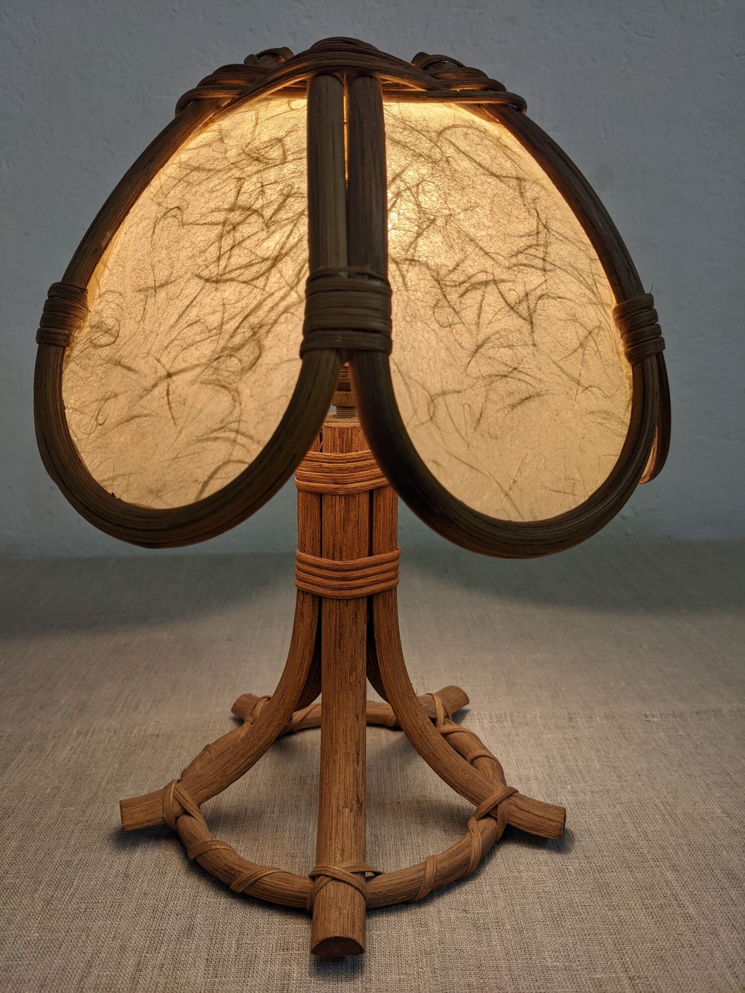 Lotus flower bedside lamp in skin and rattan from the 60s/70s