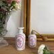 Vintage perfume bottle and spray.