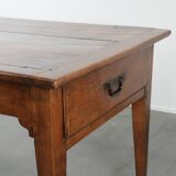 Elegant and subtle antique French dining table made of fruitwood