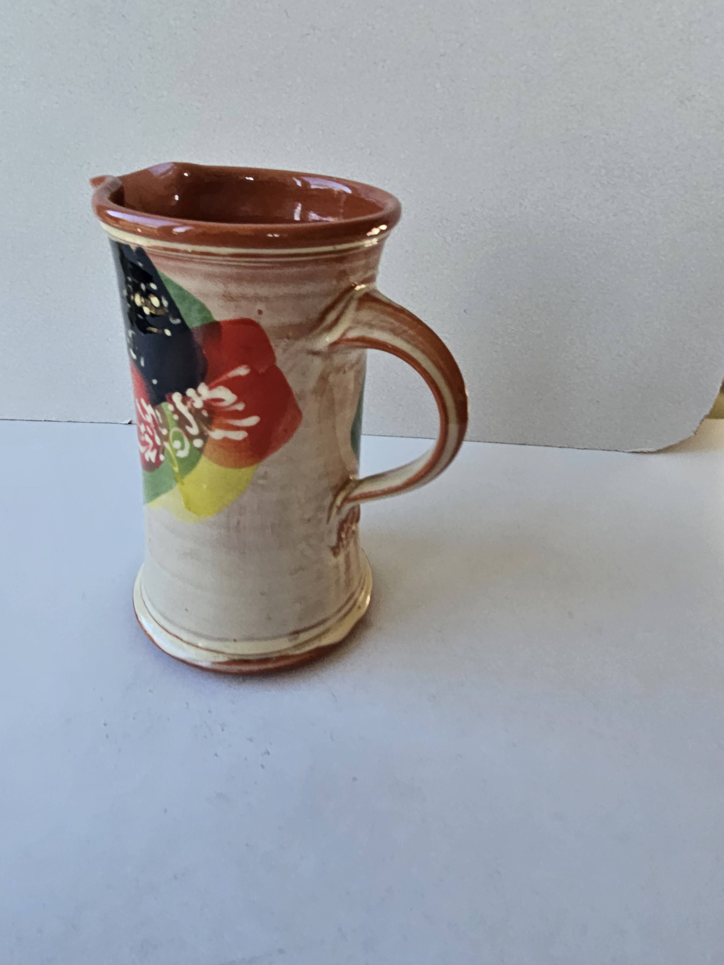 Ceramic jug with Provencal floral pattern signed (Signature to be identified)