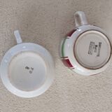 2 mismatched iron earth cups