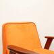 Fauteuil scandinave en velours orange par Chierowski, 1962