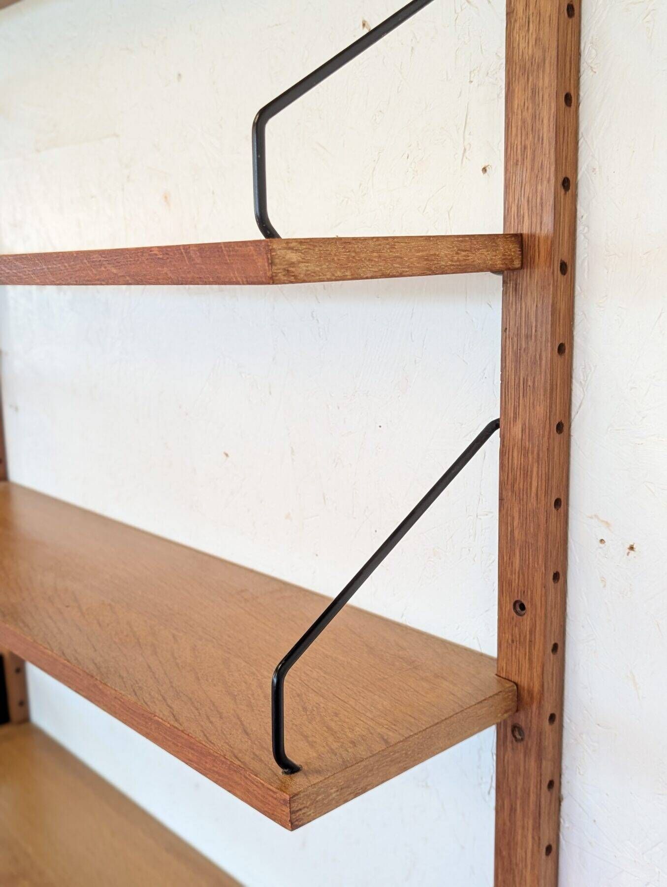 Teak wall unit by Poul Cadovius from the 1960s.