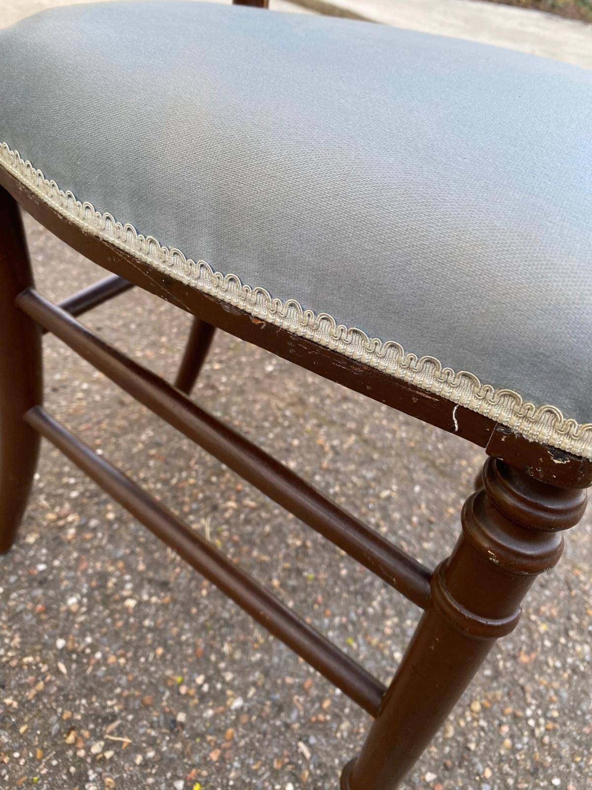 2 Napoleon III chairs in solid wood and blue satin fabric.