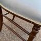 2 Napoleon III chairs in solid wood and blue satin fabric.
