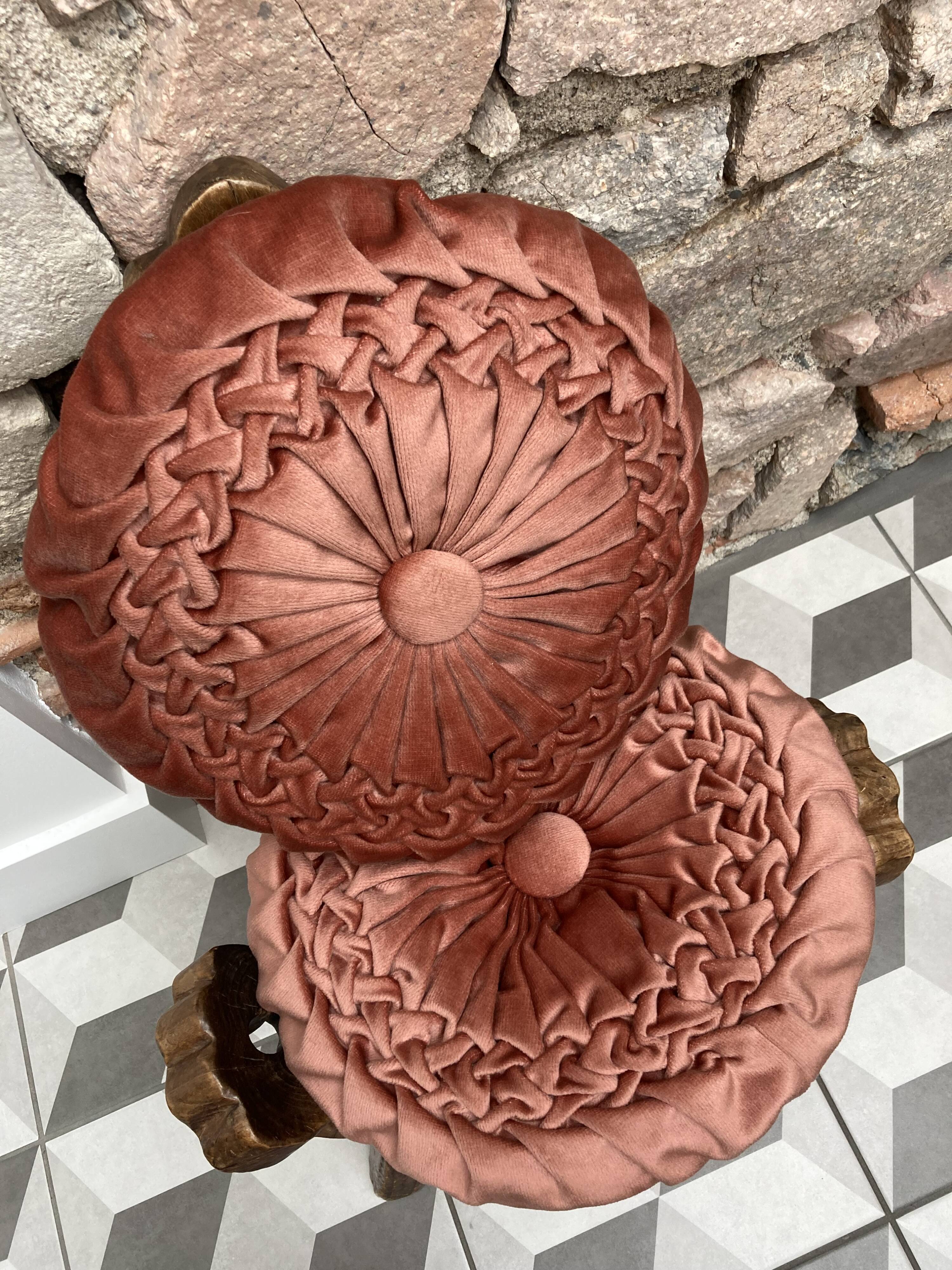 Pair of round vintage pleated velvet cushions