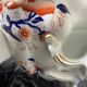 Old Imari cup stamped "Mason" in iron earth