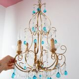 Italian chandelier in gold metal and blue crystal drops