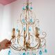 Italian chandelier in gold metal and blue crystal drops