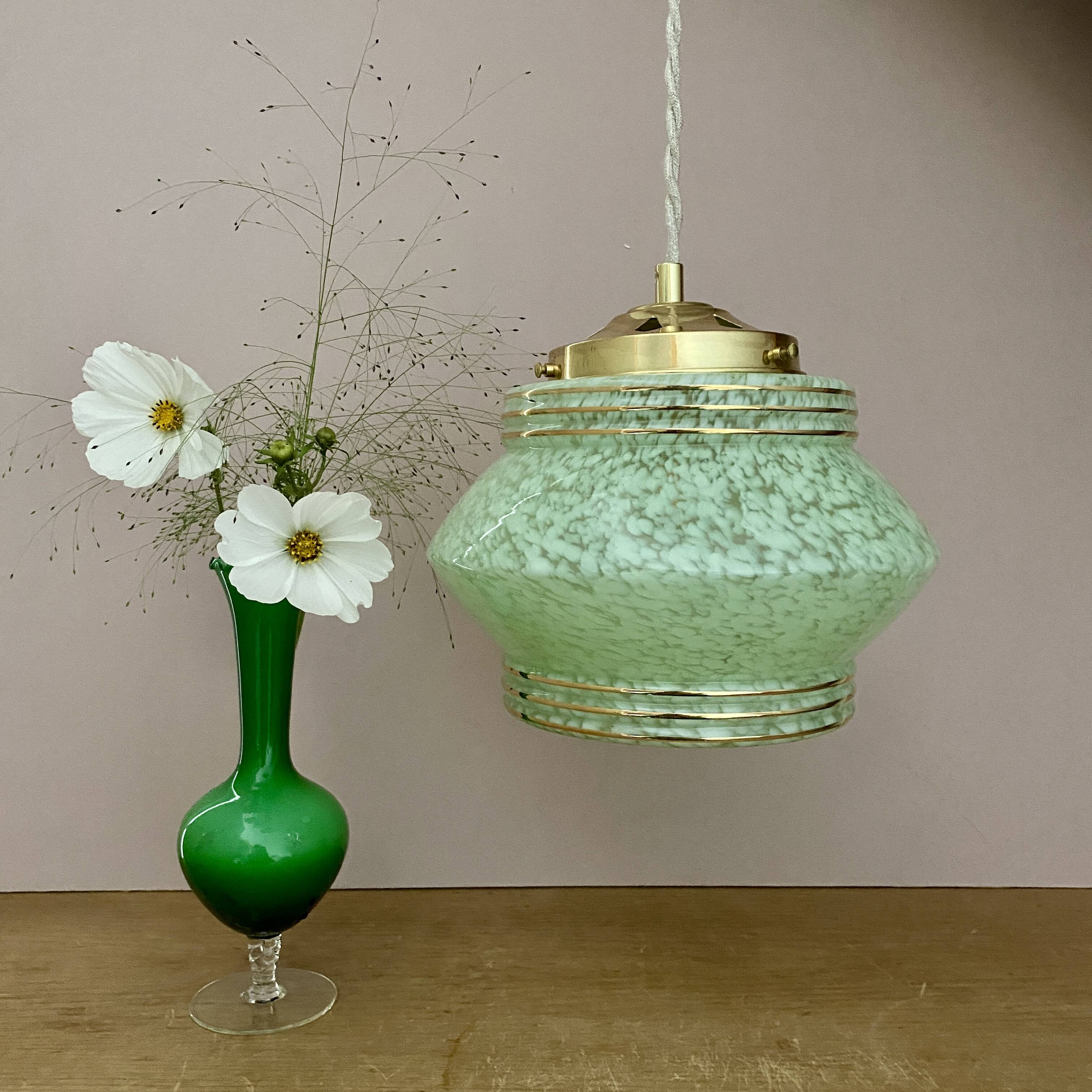 Art Deco globe pendant light in mint green and gold Clichy glass