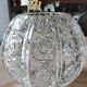 Vase shaped ball in carved Bohemian crystal. Star motifs, diamond braces, hardwoods. Diam 16 cm