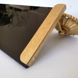 Wall shelf in glass and gold metal