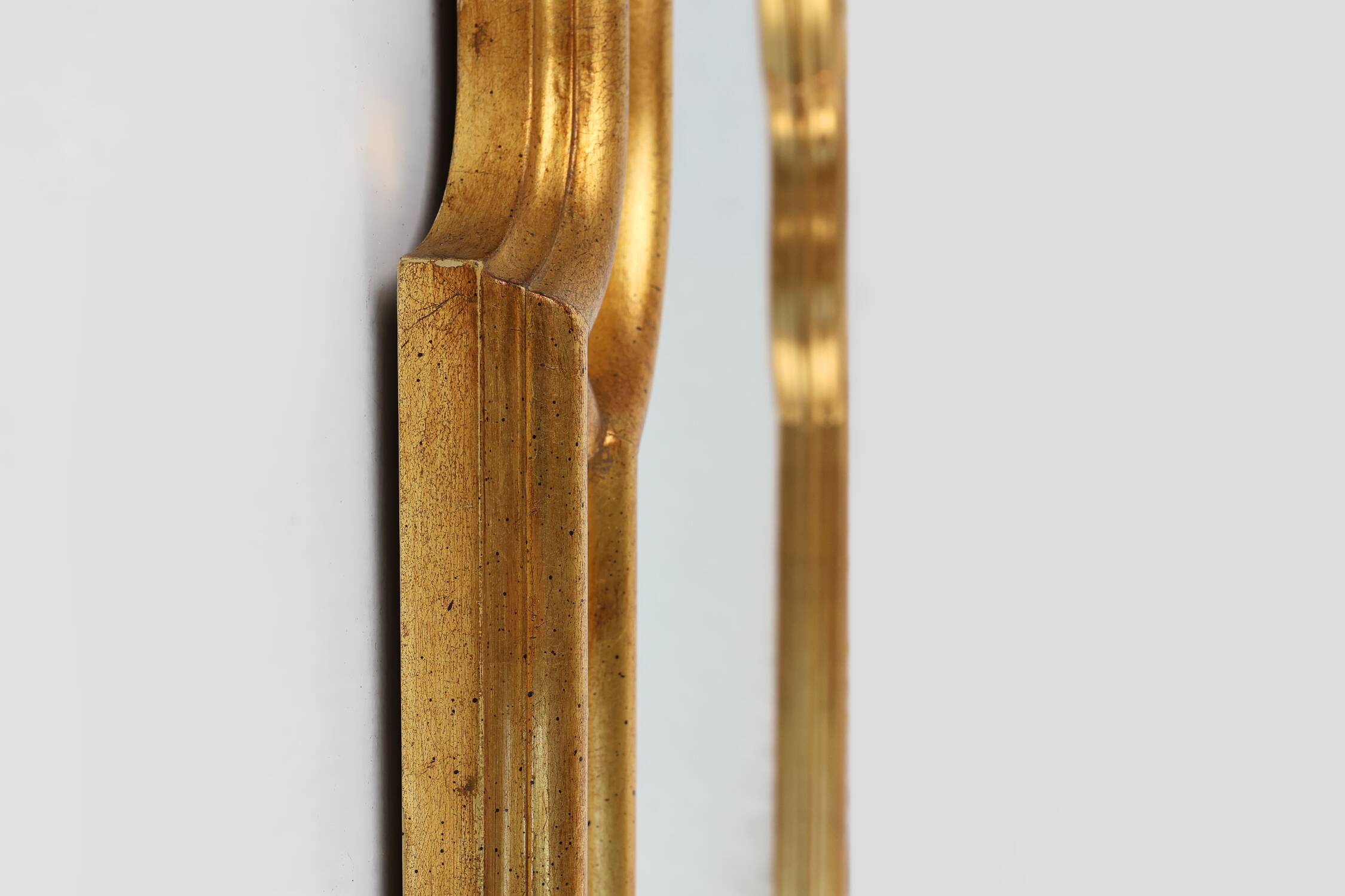 French gilt Louis Philip style mirror decorated with smoked mirror glass